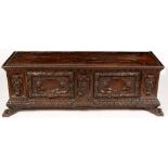 An Italian carved walnut cassone.