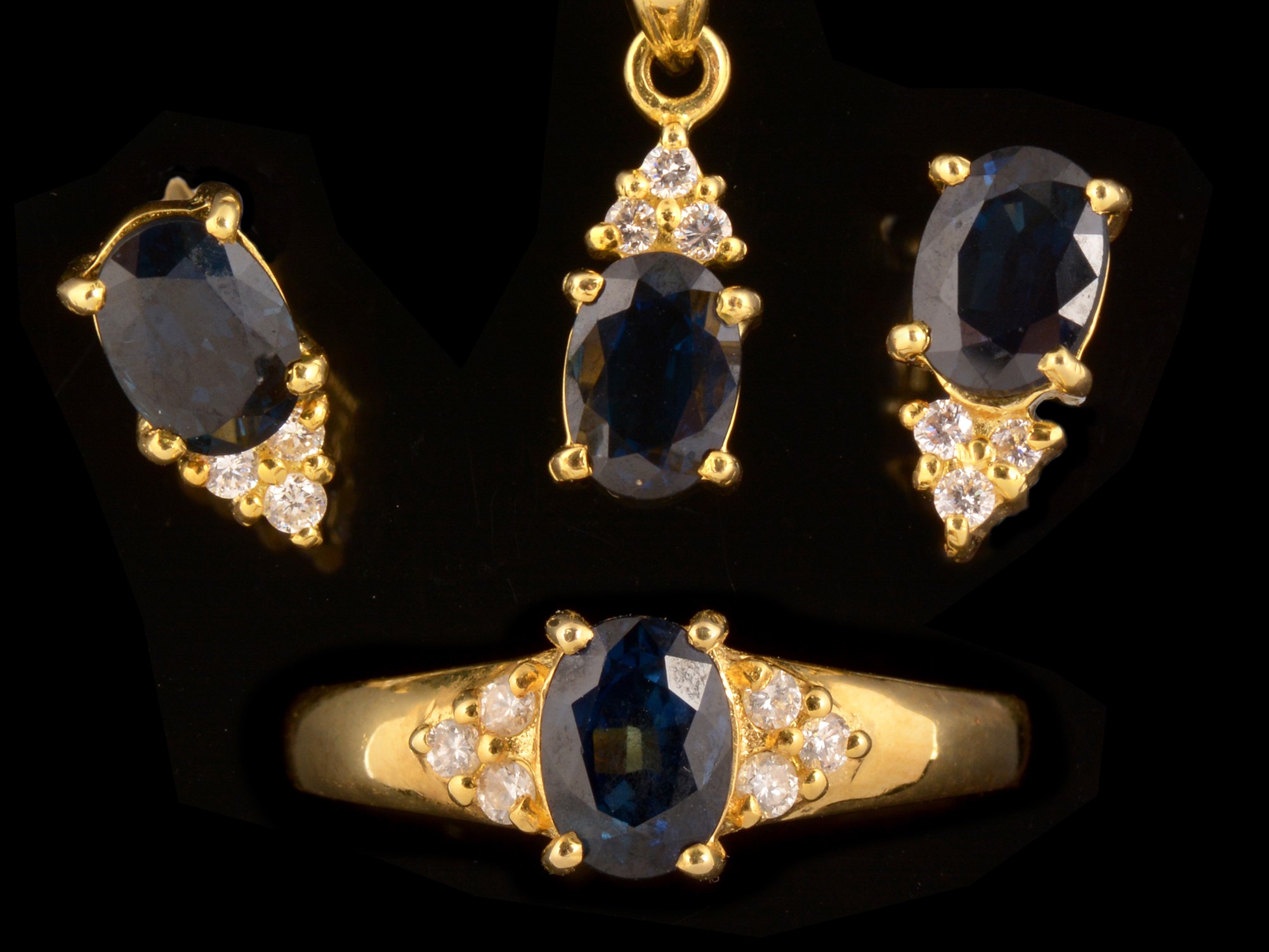 Sapphire and diamond ring, earrings and pendant