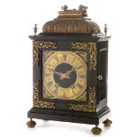 An 18th Century style ebonised and gilt bronze bracket clock; and associated bracket.