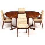 A rosewood dining table and four chairs circa 1960's