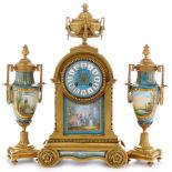 Japy Freres & Cie: a late 19th Century French gilt bronze three-piece clock garniture.