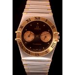 Omega Constellation: a 18ct gold & stainless steel quartz wristwatch,