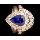 Tanzanite and diamond ring and matching diamond ring