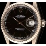 Rolex: Datejust watch.