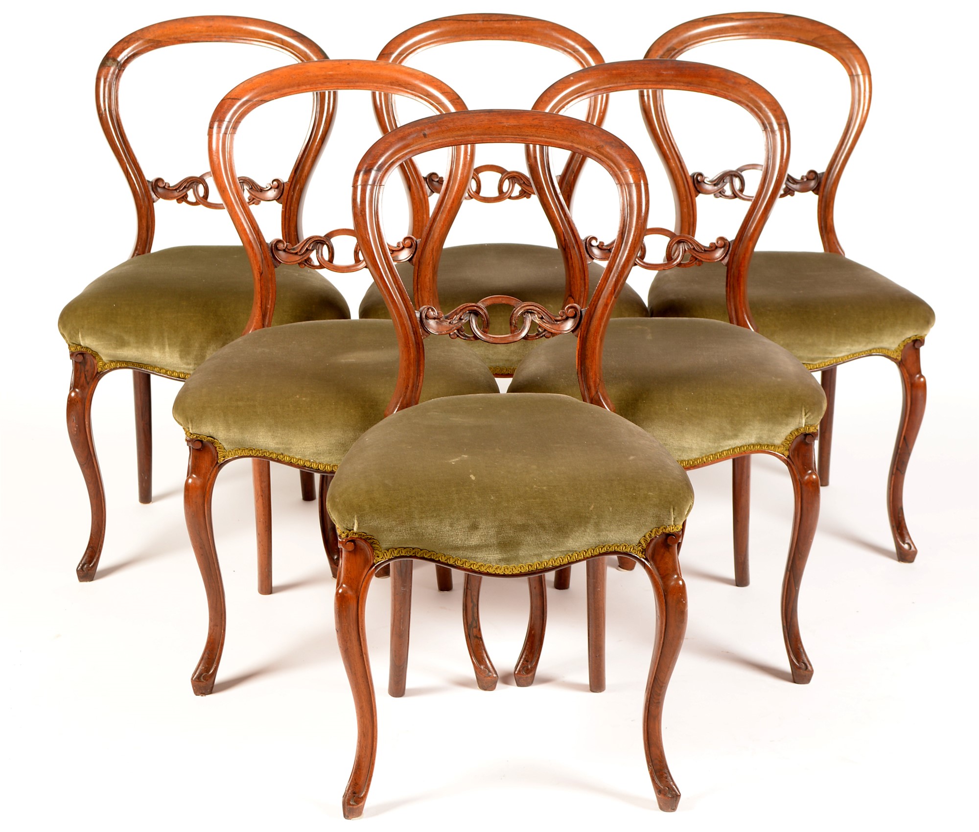 Six rosewood chairs.