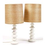A pair of 1970's white glazed ceramic table lamps