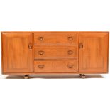 Ercol: a Windsor style sideboard.