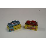 Two Corgi cars