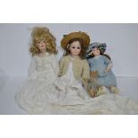 Three dolls