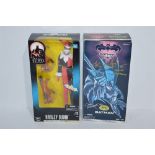 Two signed Batman action figures