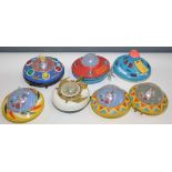 Plastic and tin plate flying saucers