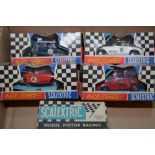 Five Scalextric cars
