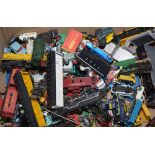 Box of trains and die-cast toys