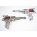 Two Lone Star 'Space Outlaw' metal pistols