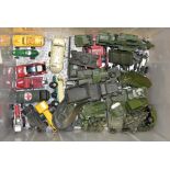 Mostly Dinky diecast vehicles, many military type, unboxed.