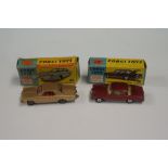 Two Corgi cars