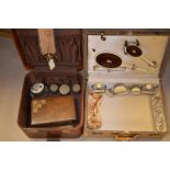 Three dressing cases