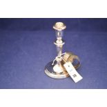 Silver candlestick and napkin rings