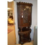 Oak corner cupboard