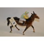 Beswick walking racehorse and jockey