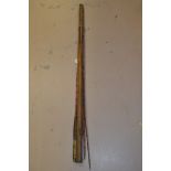 Split cane fly rod and spare tip and carrying frame.