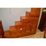 Hardwood graduating chest of drawers