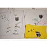 Three replica England Shirts