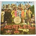 Beatles Lonely Hearts album cover signed by Peter Blake