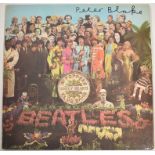 Beatles Lonely Hearts album signed by Peter Blake
