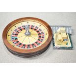 John Huxley roulette wheel, chips, stand, mat