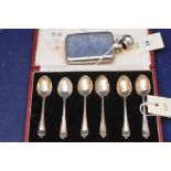 Silver teaspoons and a hip flask