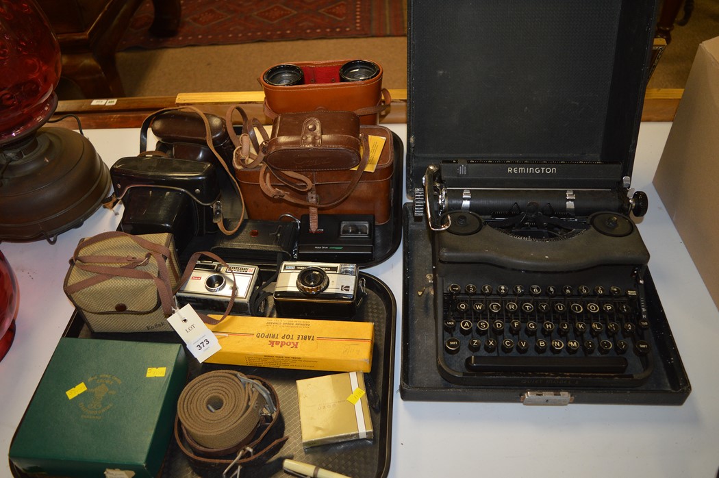 Cased vintage Remington typewriter, Quiet Model 1.; and vintage cameras, to include: Kodak Retina;