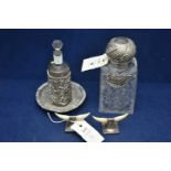 Silver mounted knife rests, and two decanters