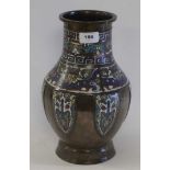 A late 19th Century Chinese bronze and champleve enamel vase.