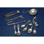 Silver sugar tongs and other items