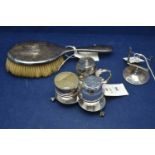 George V silver calendar stand, silver hairbrush and plated condiment set