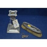 Yellow metal jewellery, silver candlestick and clothes brush