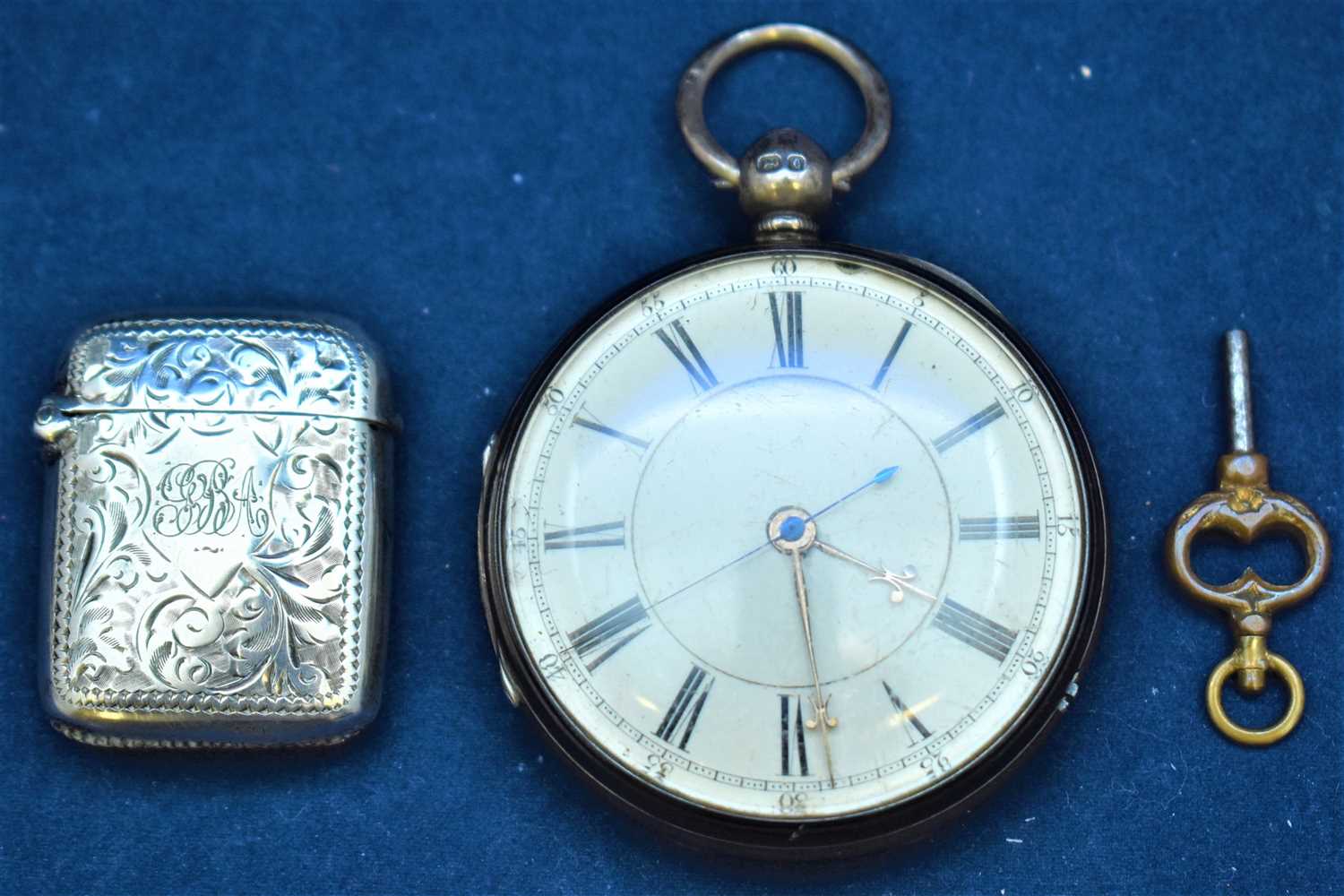 Silver pocket watch and vesta case