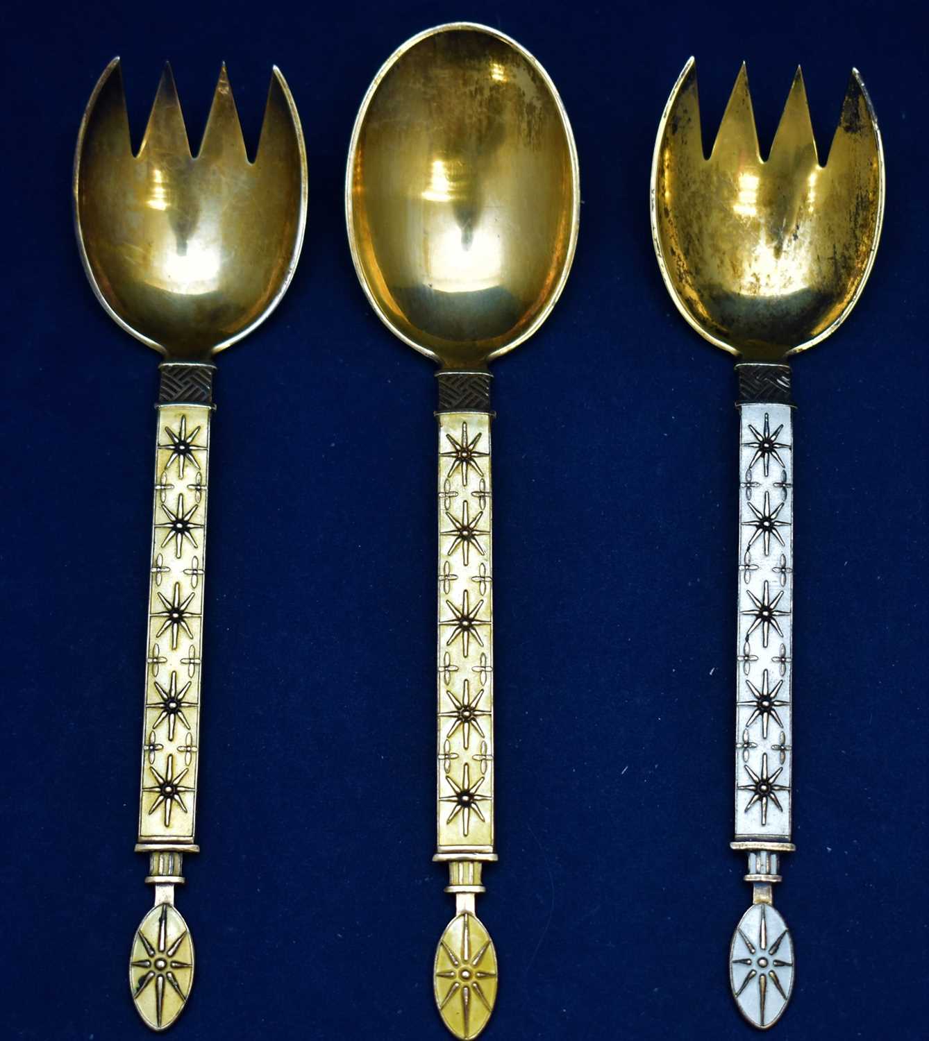 Silver and enamel fork and two spoons