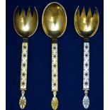 Silver and enamel fork and two spoons