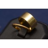 22ct gold wedding band, 3g; and a yellow metal wedding band, stamped '18ct', 8g.