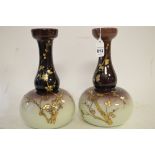 A pair of ombre cased glass vases
