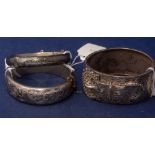 Three silver bangles