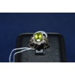 Peridot and diamond ring