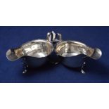 A pair of Edward VIII silver sauceboats,