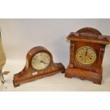 Two mantel clocks.