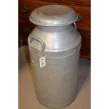 An aluminium milk churn, the lid inscribed 'Milk Marketing Board'.