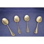 Four silver table spoons