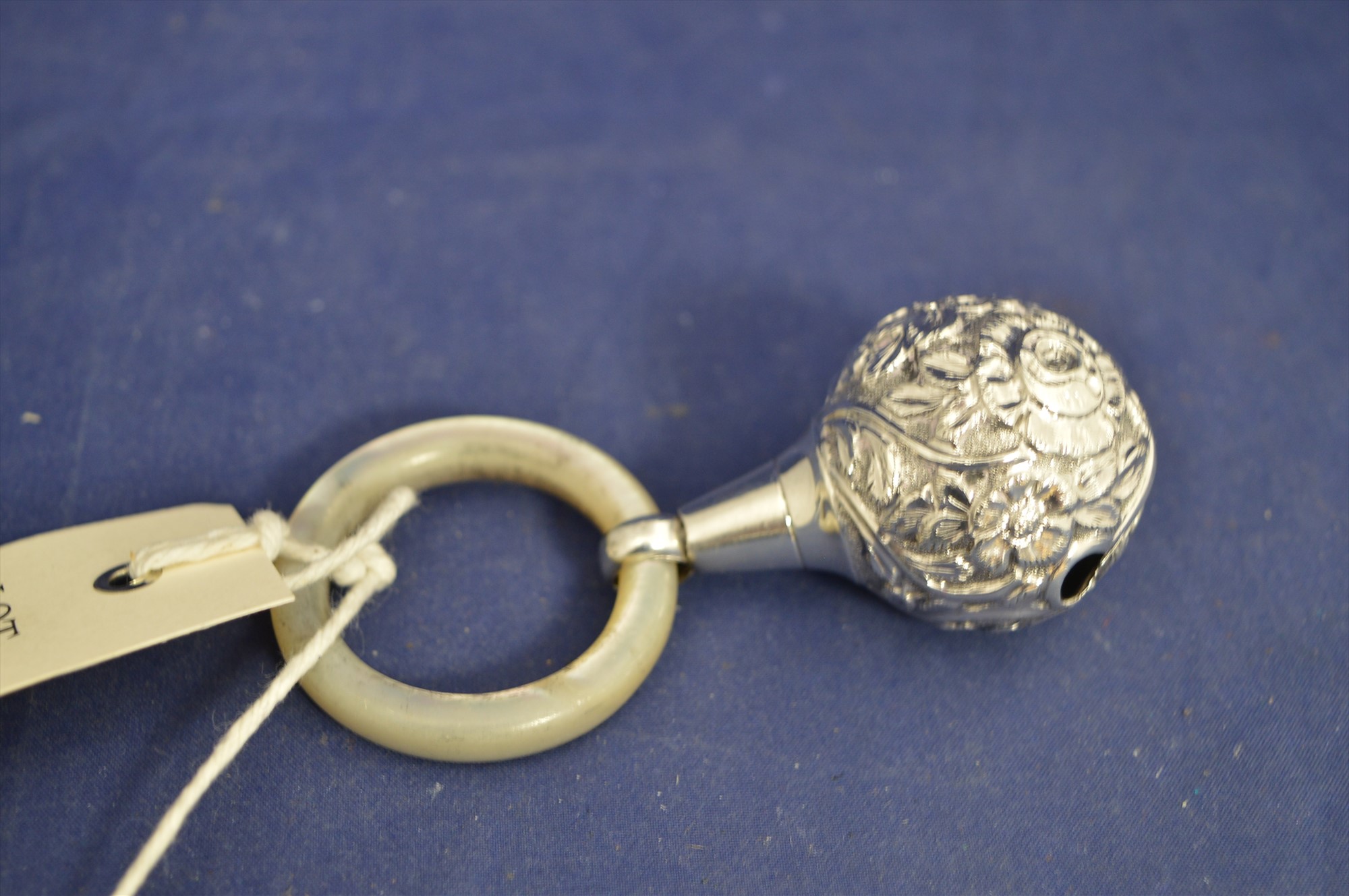 Silver child's rattle