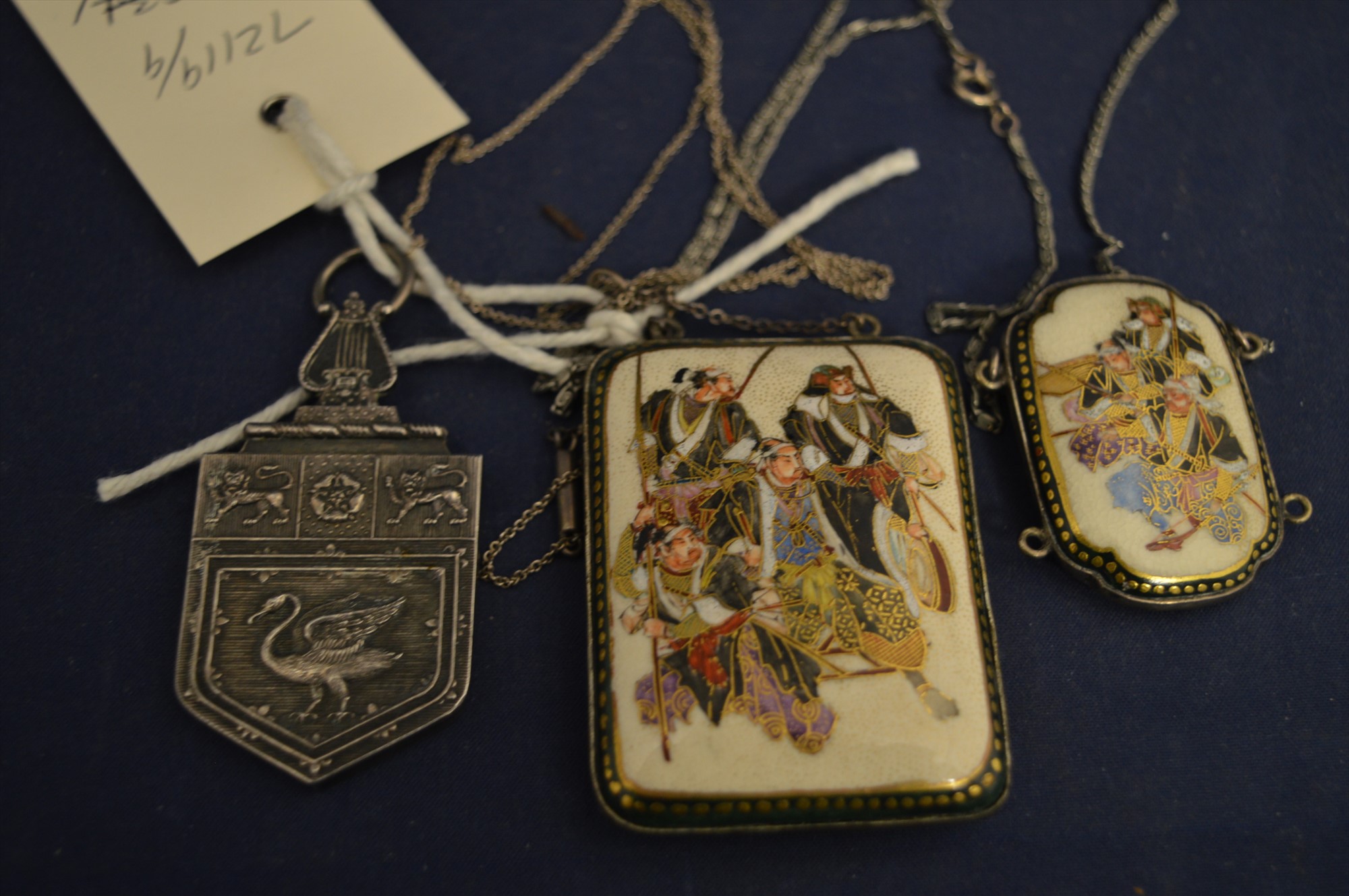 Satsuma and white metal pendants